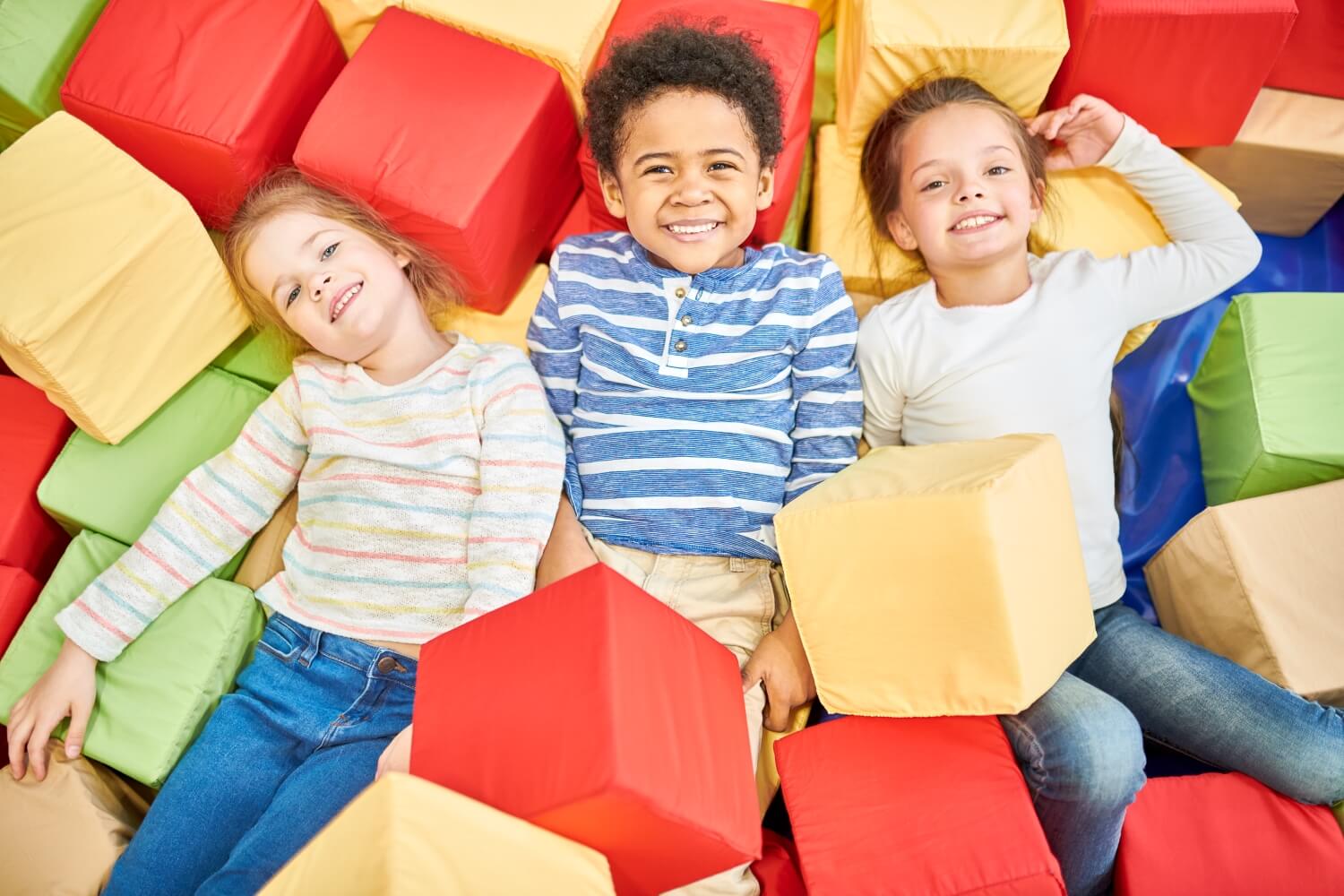 three-kids-playing-in-foam-pit-2023-11-27-05-07-03-utc.jpg